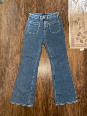 High-Rise Blue Denim Flare Jeans - Free Assembly